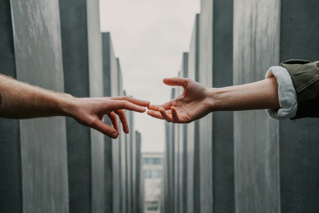 Two people touching hands to signify Direct Connection to Sellers in the blog